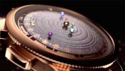 fyp-science: stuffguyswant: Galactic Watch Depicts Time Through Orbiting Planets  The Midnight Planetarium Timepiece is an astounding show of watch craftsmanship created by the brand Brand Van Cleef &amp; Arpels. The incredible astronomical watch depicts