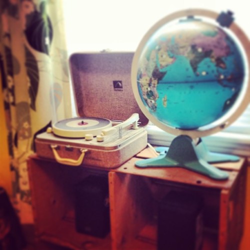 Vintage record player and globe