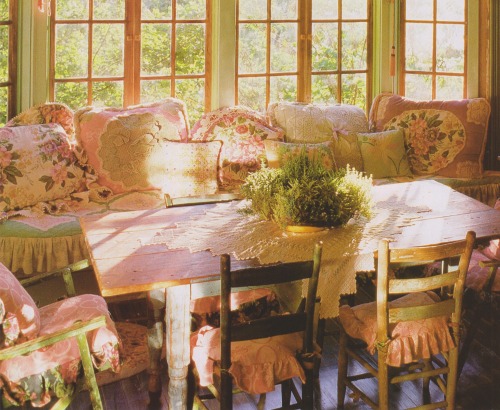 vintagehomecollection: Farm chairs in ruffles, a delicate herbal sampler, and a bay window banquette
