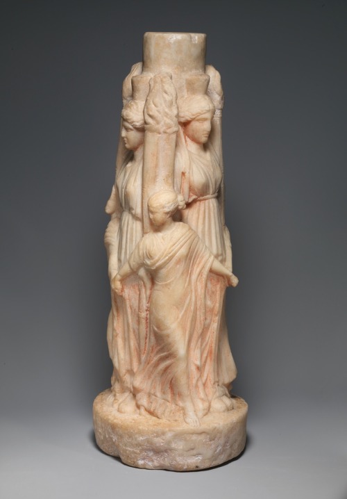 via-appia:Marble statuette of triple-bodied Hekate and the three Graces. Hekate presided over pathwa