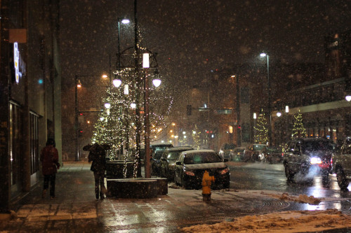 Snow falls on city streets. Snapped this in March, when it began snowing huge clusters in downtown D