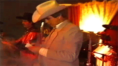 mibellavidaloca:  muthafuk:  Chalino Sanchez quite possibly being told he is about to die. This was his final performance.  I heard somewhere that in that note they told him they were going to kill him..and they did.