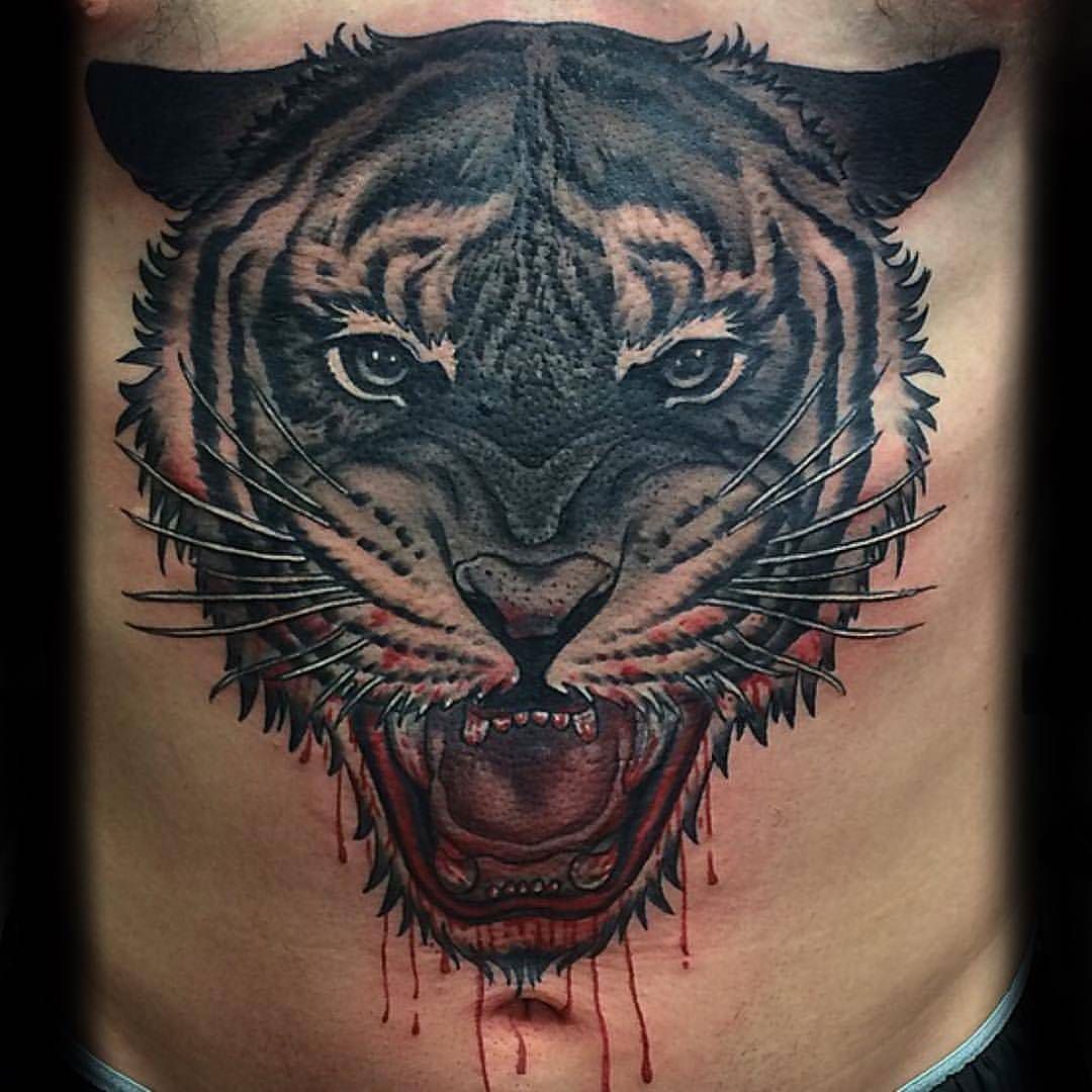 Bloody lion done by Andy at Iron Quill Tattoo Madison Wisconsin  r tattoos