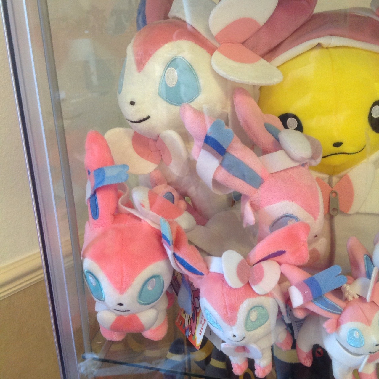 yoshijoshii:  My Sylveon collection so far! I love the pink fairy fox.   And I wonder