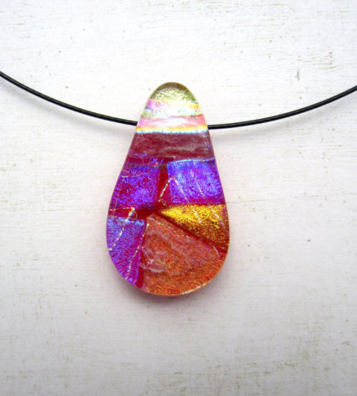 A series of collage fused glass pendants for those looking for a splash of color to brighten their w