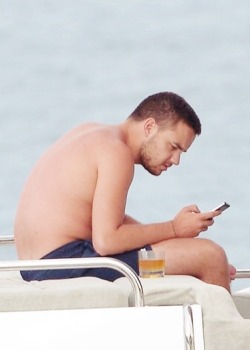 :  Liam enjoying the day on a luxury boat