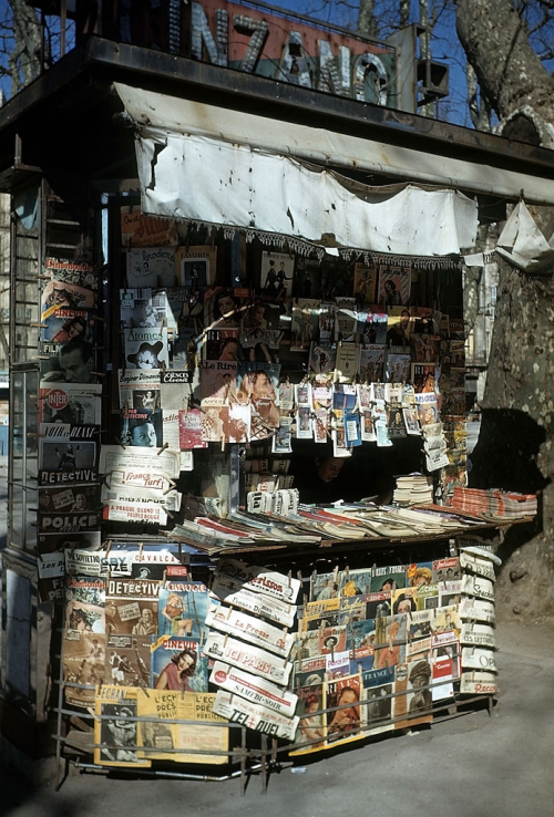 vintageeveryday:  A newspaper stand in Marseille, France, March 1948. Photographed by Ivan Dmitri.