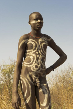 Ethiopian Mursi boy, by Georges Courreges.