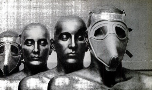 Plastic masks, which are designed to protect their wearers against gas or radioactive particles in the air, are displayed on bronze heads, 1957.