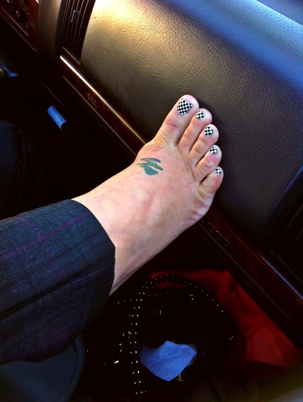 sexyitalianchick619:  My sweaty tattoo’d foot, moist and aromatic, slipping out