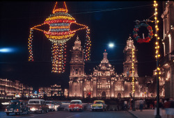 natgeofound:  Holiday lights decorate the sky, cathedral and streets of the zocalo in Mexico City, October 1961.Photograph by Kip Ross, National Geographic