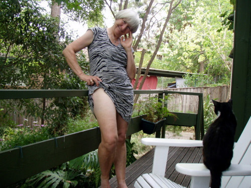 jemcasey:  Lyn, our lovely Australian granny gets naked on the deck…   Who could resist bending her over that rail and giving her hairy cunt a thorough drilling? Even though pussy seems indifferent to mistress’s charms!