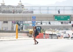 I see this woman crossing Tropicana and I