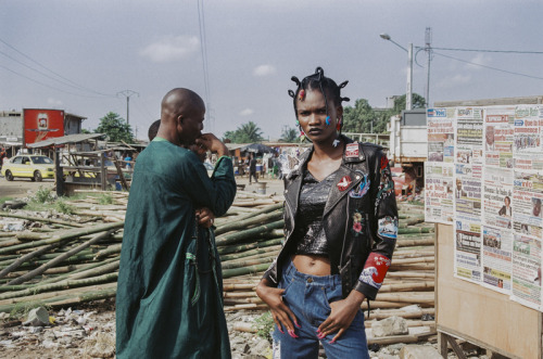 Dressed up in distressed, patched and unconventional clothing, shot on location in Abidjan, stylist 