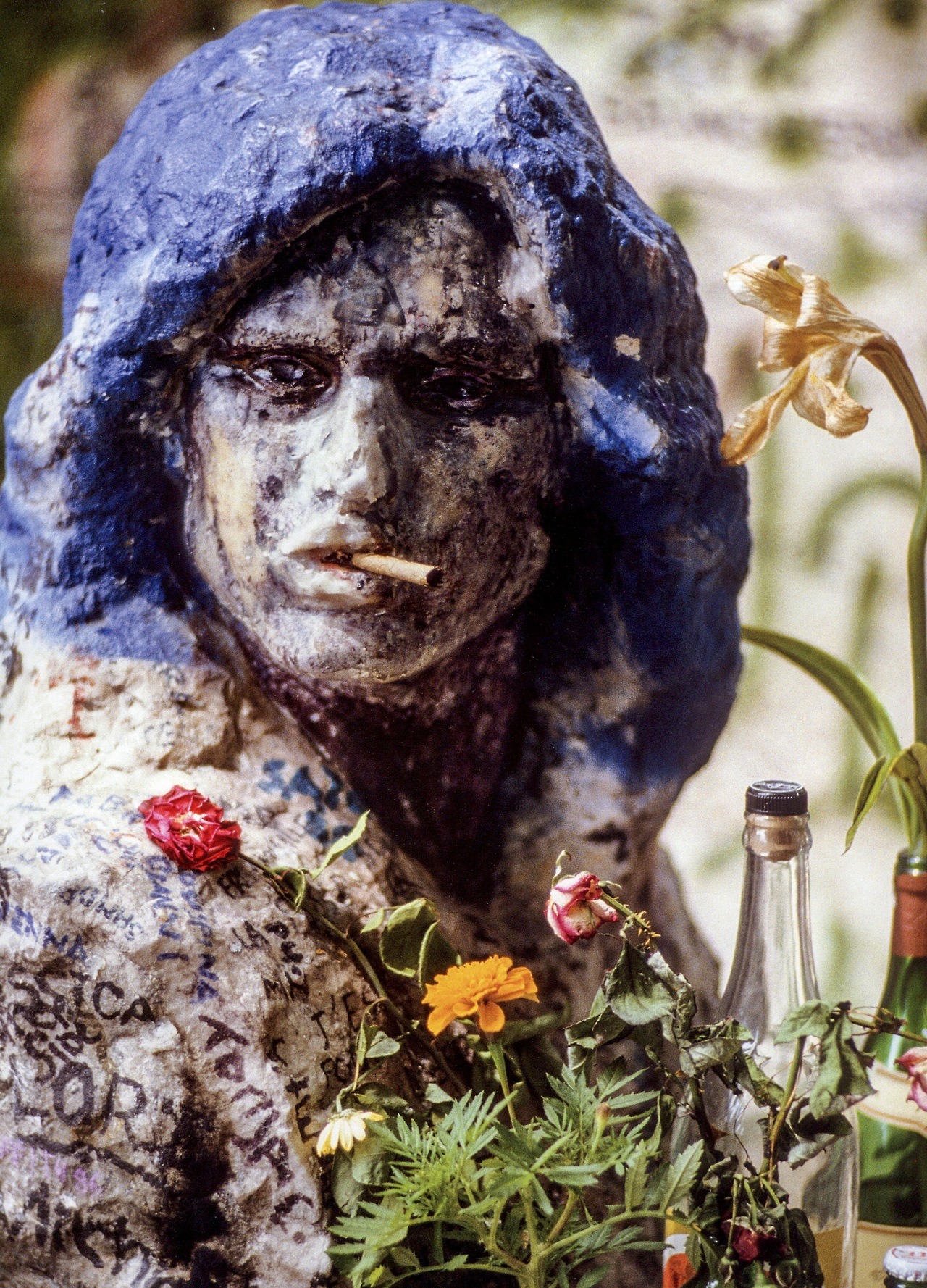 superblackmarket:  Jim Morrison’s grave photographed by Lynn Goldsmith, 1986 