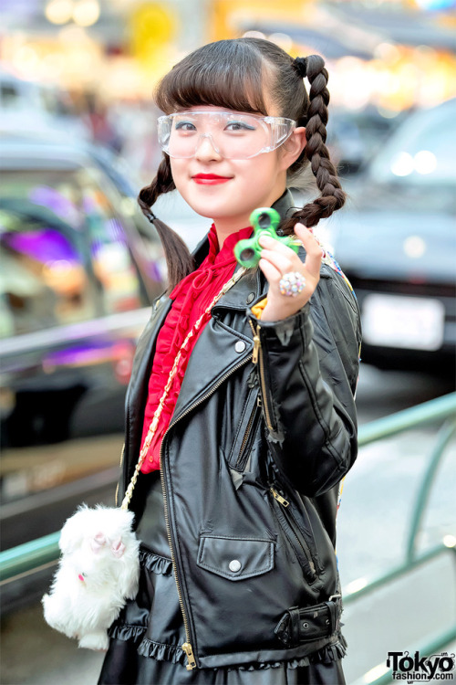 Japanese teens Haruna (15), Mawoni (15), Miori (16), and Billi Mayu (15) on the street in Harajuku w