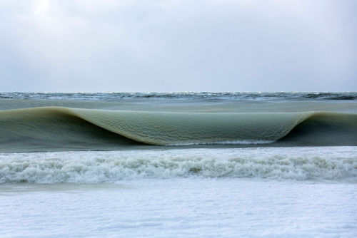itscolossal:Giant Frozen Waves Infused with Ice Slowly Roll in off the Coast of Nantucket