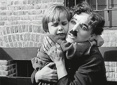 chaplinfortheages:  filmsploitation: The Kid (1921)  I always have to reblog gifs of this scene…both crying…so touchingly beautiful…