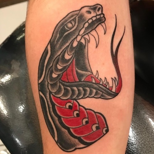 Traditional snake head by artist Ramon Negron at Empire Tattoo Boston! @empire_tattoo_boston Www.emp