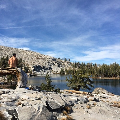 Perched overlooking a lake.