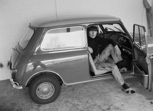 George Harrison in the garage at Kinfauns, 1965; photo by Henry Grossman.“One side of George w