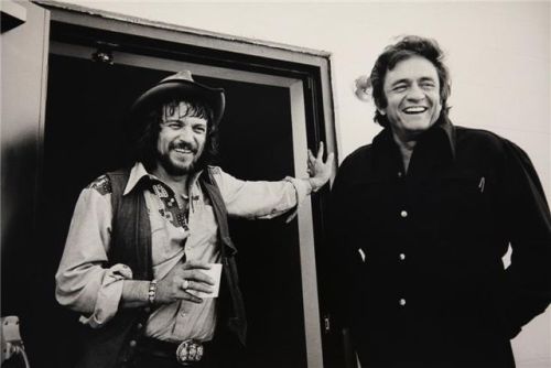 naturalbornworldshakers:  “I’ve always been crazy– but it’s kept me from going insane.” ~Waylon Jennings with Johnny Cash, 1974.  See more… 