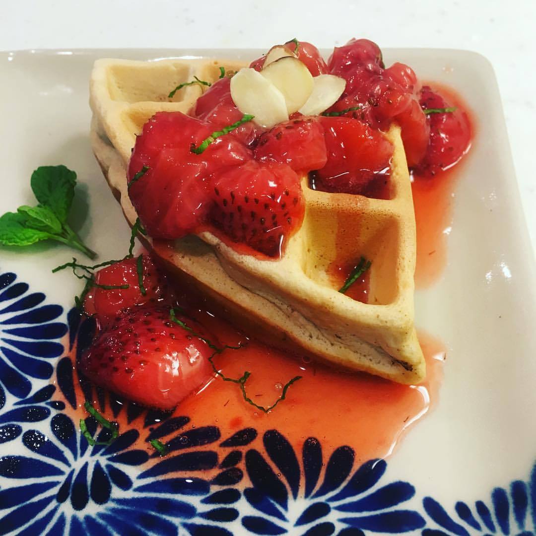 Peanut butter waffles (made with almond milk, coconut palm sugar, chia seeds) served with homemade strawberry compote