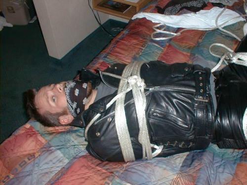 bubbabrando:  jhardcastle1976:  The best way to keep a guy in a leather biker jacket, tied up and his big mouth gagged  yes, it was quite effective. 