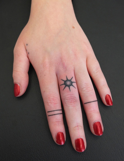 Handpoked lines and black sun!Mail me for appointments : indyvoet@msn.com