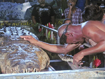 unexplained-events:  Chito and Pocho Chito says goodbye to his bestfriend Pocho, the seventeen foot half ton crocodile. Gilberto “Chito” Shedden found Pocho over 20 years wounded and near death. Pocho had been shot in the left eye by a cattle farmer.