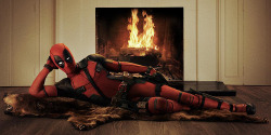 laughingsquid:First Image of Ryan Reynolds Suited Up as Deadpool Casually Posing on a Bear Skin Rug for Upcoming Film Adaptation