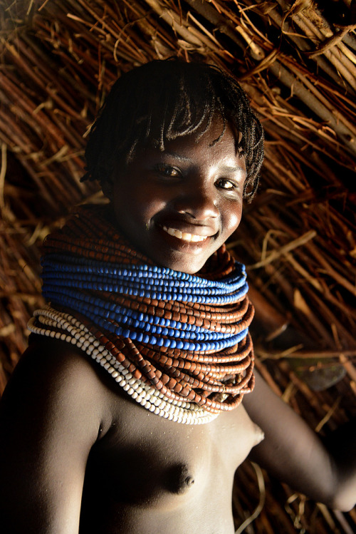 Porn photo Nyangatom girl, by Jean-Christophe Huet.