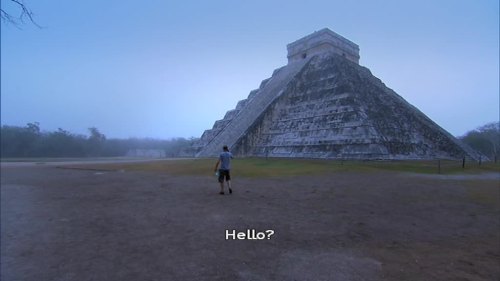 wenchyfloozymoo: Karl explaining how to play a DVD to Suzanne while at the Chichen Itza.