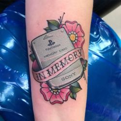 tattoosnob:  PlayStation Memory Card tattoo by @carotater at Blue Rose Tattoo in Huntsville, AL #carotater #carolinewestmeyer #bluerosetattoo #huntsville #alabama #sonyplaystation #sonyplaystationtattoo #playstation #playstationtattoo #ps2 #memorycard