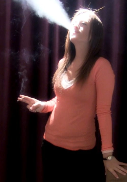 al8675309: Beautiful exhale from smokingmodels.com Great exhaled cone in good smoking lighting
