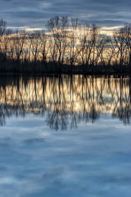 richherrmann:Moody sunset reflections near Sutliff. No wind, frogs were singing and the sun painted 