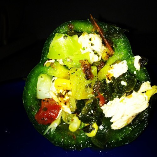 Snack!!! Stuffed green pepper! Stuffed with: broccoli, corn, chicken, tomato, kale, green pepper, mu