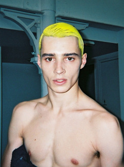onlyadrien-deactivated20150615:  Fluorescent prince Adrien Sahores backstage at Songzio S/S 2012.  