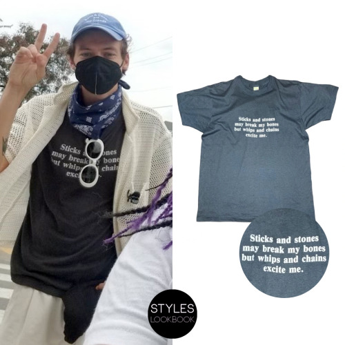 Out in Nashville, Harry was seen wearing a vintage T-shirt with ‘sticks and stones may break m