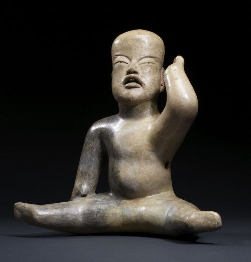 Olmec sculpture of an infantile figure, perhaps representing a shaman in communion with the maize de