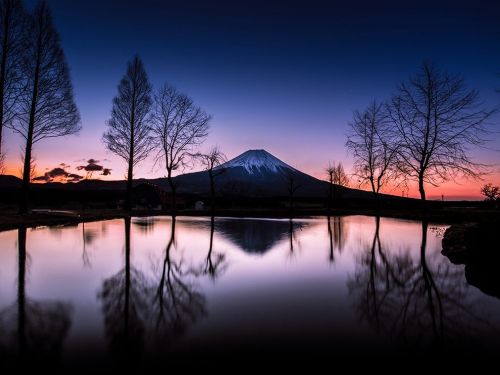 earth-land:  Mount Fuji - Japan  Rising 3776 meters above sea level, Mount Fuji is Japan’s tallest mountain and most iconic landmark. Images of the nearly perfect, solitary volcano have appeared in paintings, wood block prints and other artworks for