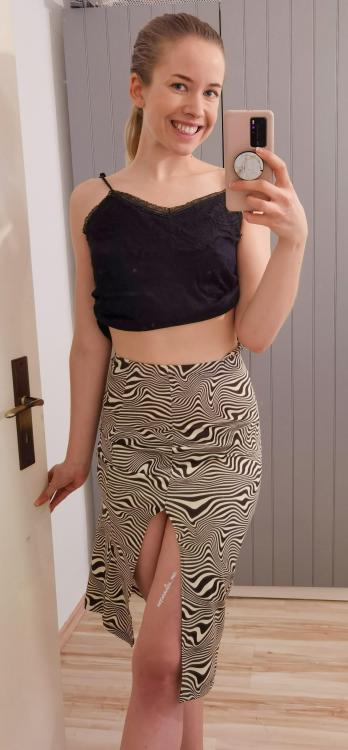 Animal print and a high slit. How do I look?