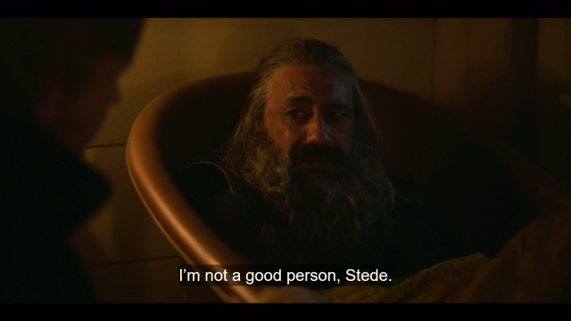 screencap of ed sitting in stede's bathtub, visibly upset. subtitles read "i'm not a good person, stede."