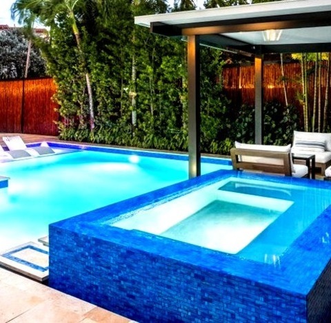 Modern Pool - PoolInspiration For A Mid-sized Modern Backyard Stone And Custom-shaped Lap Hot Tub Remodel