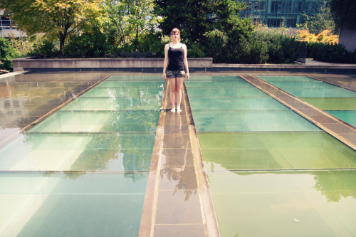 Savannah being a rebel and trespassing on the law court’s rooftop fountain in Vancouver, BCJuly 2015