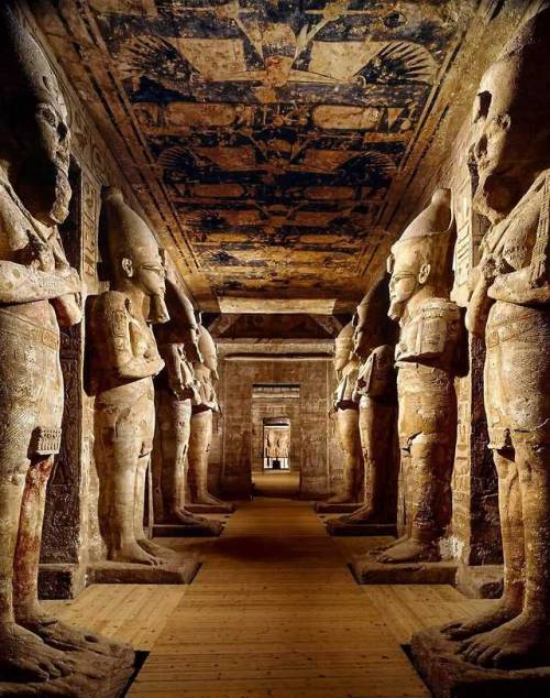ancientorigins: All of these giant statues sculpted inside the mountain, inside Abu Simbel temple.