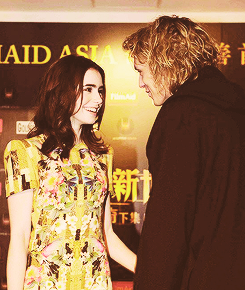 clarissawayland:  Jamie Campbell Bower and Lily Collins at the BD Part 2 Premiere in Hong Kong on dec 12, 2012 