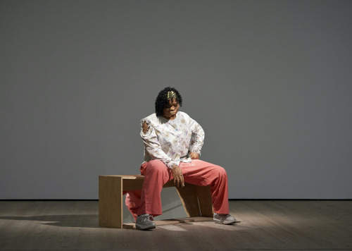 In Karon Davis’s nearly life-sized sculpture “Nicotine,” a tired yet resolute nurse sits alone, savo