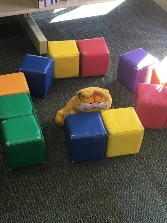 commanderfreddy:  i work in a library right now its school holidays and a lot of kids get just dumped there by their parents and told to amuse themselves they get bored very quickly today they put garfield in jail i was too afraid to ask what his crimes