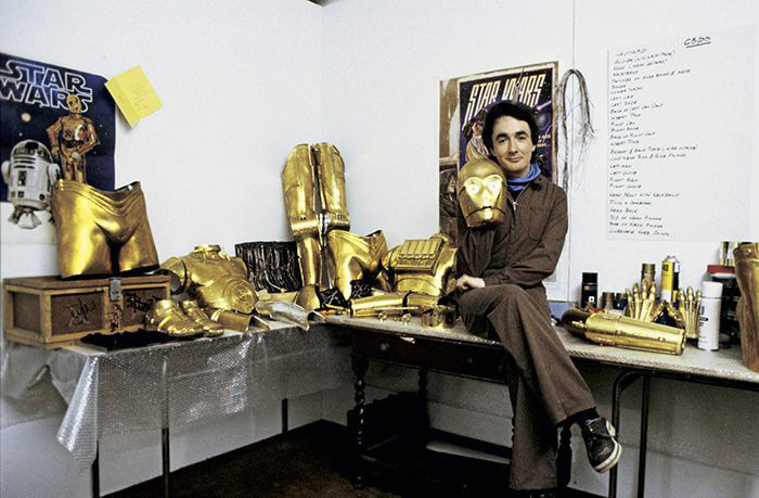 gameraboy:  Anthony Daniels with the C-3P0 costume during filming of The Empire Strikes